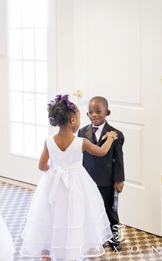 Cute African American ring bearer and flower girl Ashton Garden Atlanta wedding | Jaxon Photography    atlanta wedding photographer | atlanta weddings | atlanta wedding venue | black love | purple wedding bouquet | calla lily bouquet Ring Bearer And Flower Girl, Flower Girl And Ring Bearer