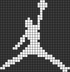 a cross stitch pattern in white and black with the letter y on it's side