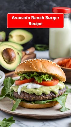 an avocado ranch burger with lettuce and tomatoes