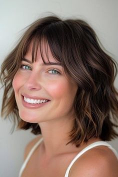 35 Stunning Medium-Length Hairstyles with Bangs - The Hairstyle Edit Med Length Hair With Wispy Bangs, Bangs With Medium Hair Wavy, Shoulder Length Wavy Bob With Bangs, Bangs With Wavy Hair Shoulder Length, Midlength Haircuts With Wispy Bangs, Medium Length Hair With Bangs, Bangs With Medium Hair, Medium Curly Hair Styles, Brunette Hair With Highlights