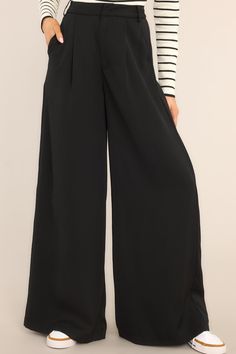 Be the talk of the office in these Office Chic Black Pants! Show 'em who's boss while flaunting your fashion in these timeless versatile black trousers - guaranteed to keep you chic and professional for any occasion. Look effortless when you step into the office. These pants feature a high waist fit, a hook and bar closure, belt loops, pockets, and a wide leg. 100% Polyester Hand Wash Cold Unlined Imported Model is wearing a size small Chic Wide Leg Workwear Bottoms, Chic Wide-leg Workwear Bottoms, Chic Wide Leg Bottoms For Workwear, Chic Wide-leg Pants For Work, Black High Waist Wide Leg Pants For Work, Black Wide Leg Office Pants, Office Wide Leg Black Pants, Black High Waist Wide Leg Business Pants, High Waist Black Wide Leg Pants For Office