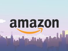 an amazon logo over a city skyline