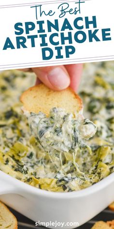 spinach artichoke dip in a white bowl with crackers