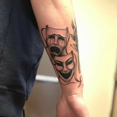 a person with a mask on their arm