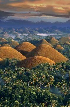 an aerial view of the chocolate hills in boholi, fiji with text overlay