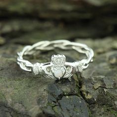 Claddagh ring, ladies claddagh ring on celtic rope band set with a beautiful opal gemstone measuring 1.75mm. This claddagh ring measures 6.5mm from the top of the crown to the bottom of the heart. This elegant Diamond Claddagh Celtic Ring is available in silver or 9K, 14K or 18K. Also in Platinum. Made in our workshop in Dublin, Ireland. FREE SHIPPING TO UNITED STATES AND EUROPE. 60 DAY RETURNS. The Claddagh is my favorite ring style to make because of its strong recognizable culture identity an Claddagh Engagement Ring, Irish Wedding Rings, Claddagh Necklace, Diamond Claddagh Ring, Claddagh Ring Wedding, Funky Accessories, Fun Costumes, Irish Ring Claddagh, Septum Rings