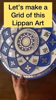 someone holding up a plate with the words let's make a grid of this lippan art