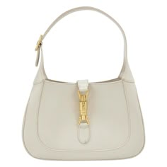 Gucci Jackie 1961 White Leather Bag with Adjustable Strap Size Small These are professional photos of the actual bag offered by Luxbags. The Gucci Jackie 1961 White Small bag is a modern take on an iconic design. Crafted in leather with a structured silhouette, it features a crossbody strap so you can bring your essentials wherever life takes you. Its baby blue hue is sure to add a touch of elegance to your wardrobe. CONDITION: VERY GOOD This preloved authentic bag is in very good condition with moderate signs of use throughout. Stains on the bottom and rubbing around the corners. DETAILS GUCCI Jackie 1961 White calfskin leather Beige suede lining Gold-tone hardware Piston lock Size Small Width: 27cm x Height: 18.5 x Depth 3.5cm ACCESSORY: Adjustable long shoulder strap White Jackie Bag, Gucci Jackie White, White Designer Gucci Bags, Gucci Jackie 1961 Bag, Gucci Jackie Hobo Bag Vintage, White Gucci Bag, Gucci Jackie 1961, White Leather Bag, Gucci Purse