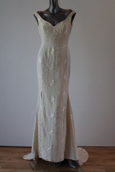 Caroline Holmes Rose Embroidered Double Silk Crepe Gown - Etsy Silk Cream Evening Dress With Fitted Bodice, Wedding Gown With Floral Embroidery And Fitted Bodice, Cream Silk Evening Dress For Wedding, Fitted Floral Embroidered Evening Dress For Wedding, Fitted Embroidered Evening Gown, Silk Wedding Dress With Floral Embroidery, Embroidered Fitted Evening Gown, Cream Floor-length Gown With Floral Embroidery, Embroidered Fitted Gown For Evening