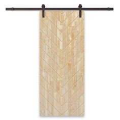 a wooden wall hanging on a metal bar with an arrow pattern in the center and bottom