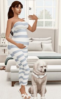 a pregnant woman standing next to a dog