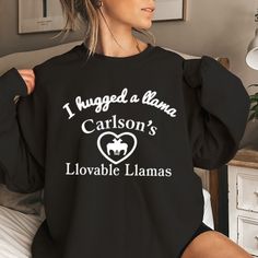 I Hugged A Llama Carlson Llovable Llamas Shirt: Embrace the whimsical and heartwarming charm of llamas with this shirt that proudly declares "I Hugged A Llama Carlson Llovable Llamas." This shirt captures the joy and affection associated with these gentle creatures. Wear it to showcase your love for animals, to spread positivity, and to add a touch of cuteness to your style. Llama Shirt, Spread Positivity, Christmas Delivery, Clothing Company, Polo Shirts, Llama, Custom Clothes, Custom Shirts, Company Logo