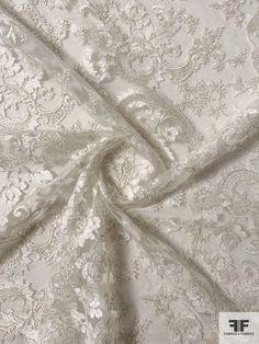 an image of a white lace fabric