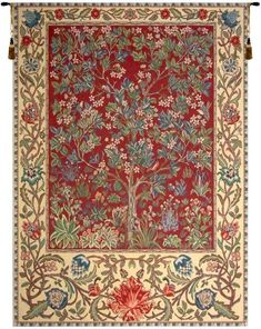 an old rug with flowers and leaves on it