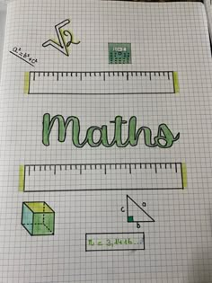 a notebook with the words maths written on it