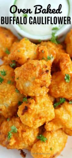 the buffalo cauliflower is served with ranch dip and parsley on the side