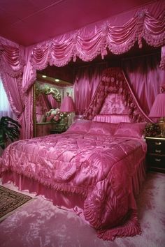 a bedroom with pink bedding and curtains