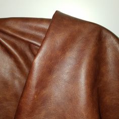 PRICES MAY VARY. Size: 20 inch x 30 inch Leather has a 2 tone high-low effect Italian Cowhide leather Uses: Craft, upholstery, handbag, garment, bookbinding, pillow case, chairs, sofa chap 1.0-1.2 mm or 2.0-2.5 oz Our materials are renowned for their durability, cost-effectiveness, and ease of maintenance, making them a preferred choice for fashion-forward individuals and businesses alike. Whether you're looking to create stylish apparel, chic accessories, or sophisticated home decor, NAT Leathe Texture Cuir, Cowhide Upholstery, Leather Christmas, Faux Leather Handbag, Cow Skin, Leather Skin, Leather Hide, Leather Texture, Old English