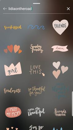 some stickers that are on the side of a glass door with words and hearts