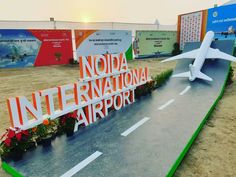 there is a sign that says noida international airport