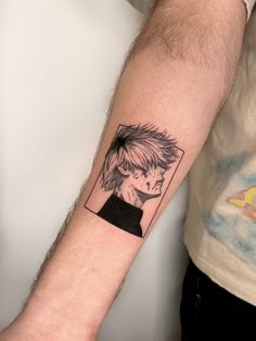 a person with a tattoo on their arm