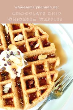 waffles on a plate with whipped cream and chocolate chips in the middle,