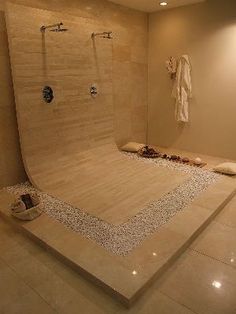 a bathroom with a large walk in shower