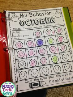 an activity book with the words my behavior october on it