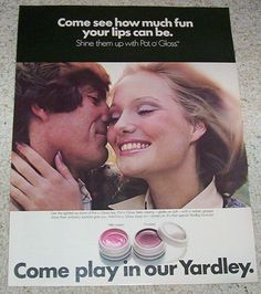 an advertisement for yardley's lip balm is displayed on the floor in front of a man and woman