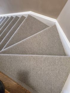 the carpeted stairs are lined up and ready to be installed