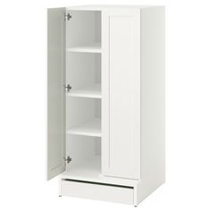 a white cabinet with two doors and shelves on the bottom, in front of a white background