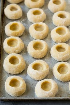 doughnut holes on a baking sheet ready to be baked