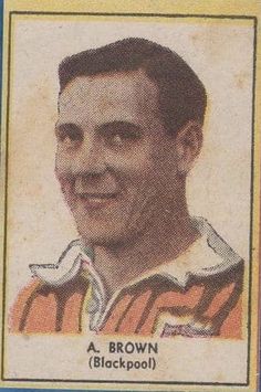 an old football card with a man's face and name on the back side