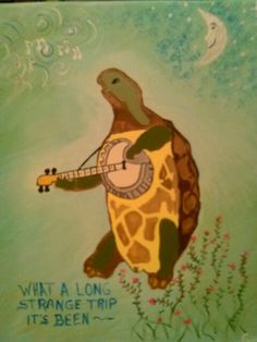 a painting of a giraffe with a guitar in it's mouth and the words what a long strange trip its been