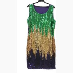 Mardi Gras Sequin Splash Party Cocktail Ball Party Masquerade Parade Dress New Orleans Purple Green And Gold This Gorgeous Shiny Purple, Green, And Gold Sequined Cocktail Dress Features A Flame Or Ombr Pattern On The Front And Plain Purple Knit Fabric On The Back. There Is Stretch And Give, So It Will Adjust To Your Body While You Dance Or Sit Down, And There Is A Lining Behind The Sequin Layer For Smoothness And Comfort. The Icing On The Cake: It Makes That Fun Sequin Swishing Sound When It Mov Red Leopard Dress, Mardi Gras Dress, Plain Purple, Splash Party, Parade Dress, Mardi Gras Costumes, Target Dress, Ball Party, Purple Knit