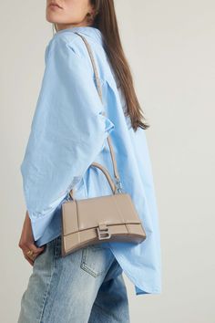 BALENCIAGA Hourglass small leather tote Balenciaga Hourglass Purse, Balenciaga Hourglass Bag Outfit, Small Bag Outfit, Balenciaga Bag Outfit, Balenciaga Hourglass Bag, Bag Outfit, Balenciaga Bag, Cut Out Top, Hailey Bieber