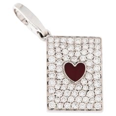 The Cartier Ace of Hearts Limited Edition Charm is a distinctive and exclusive piece that embodies the craftsmanship and elegance synonymous with the Cartier brand. The charm is shaped like the iconic Ace of Hearts playing card, featuring the heart symbol at the center. This design choice adds a playful and whimsical touch, making it a unique and eye-catching accessory. Crafted from high-quality precious metals, such as 18 karat white gold, the charm ensures durability and a luxurious aesthetic. The choice of materials reflects Cartier's commitment to using only the finest elements in their creations. To elevate the charm's allure, Cartier incorporates approximately 80 round brilliant cut diamonds VVS clarity, E color for 1.50ct total and two red enamel hearts. These carefully selected sto Hearts Playing Cards, Ace Of Hearts, Heart Symbol, Large Jewelry, Playing Card, Accessories Unique, Round Brilliant Cut Diamond, Make And Sell, Round Brilliant Cut