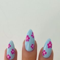 Blue Flowered Nails, Red And Purple Nails Designs, Nail Ideas Blue Flowers, Cute Nail Ideas Almond Shape, Blue Nail Flower Designs, Blue Nails Flower, Blue And Pink Flower Nails, Pink Purple Blue Nails, Pink Nails Blue Flowers