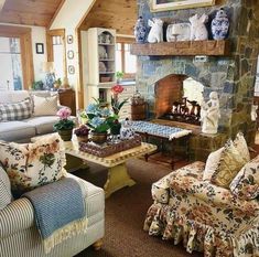 a living room filled with furniture and a fire place