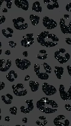 black and white animal print fabric with stars on the top, as well as glitter