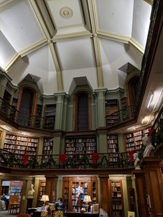 the inside of a library with lots of books