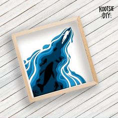 an image of a wolf in the water on a white wooden background with text that reads kotche diy