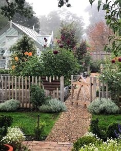 an image of a garden with flowers and trees in the background, that reads interest