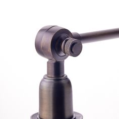 an old fashioned metal faucet is shown against a white background with the handle extended