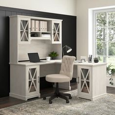 a white desk and chair in a room