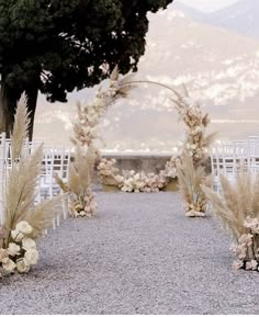 an image of a wedding ceremony with flowers on the aisle