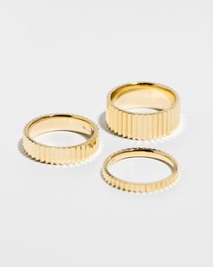 The ultimate stacking ring! Available in three widths - Slim (2 mm), Classic (5 mm), and Wide (8 mm). Timeless 14k Gold Rings With Fluted Bezel, Timeless 14k Gold Ring With Fluted Bezel, 14k Gold Promise Ring With Fluted Bezel, Timeless Stackable Yellow Gold Couple Rings, Ribbed Wedding Band, Stackable 14k Gold Couple Rings, Everyday Stackable Couple Rings In 14k Gold, Modern Stackable Yellow Gold Bands, Everyday Stackable 14k Gold Couple Rings