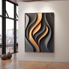 an abstract painting hanging on the wall in a room