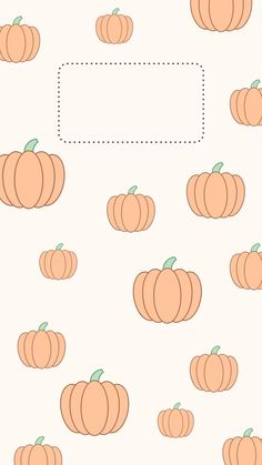 a pattern with pumpkins on it and an empty rectangle in the middle,