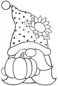 a black and white drawing of a santa hat with pumpkins